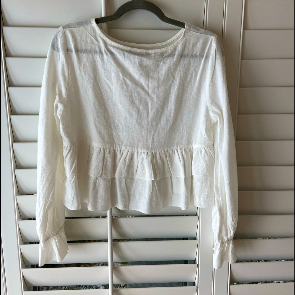 White long sleeve top